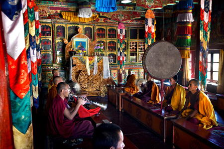 Monks performing puja